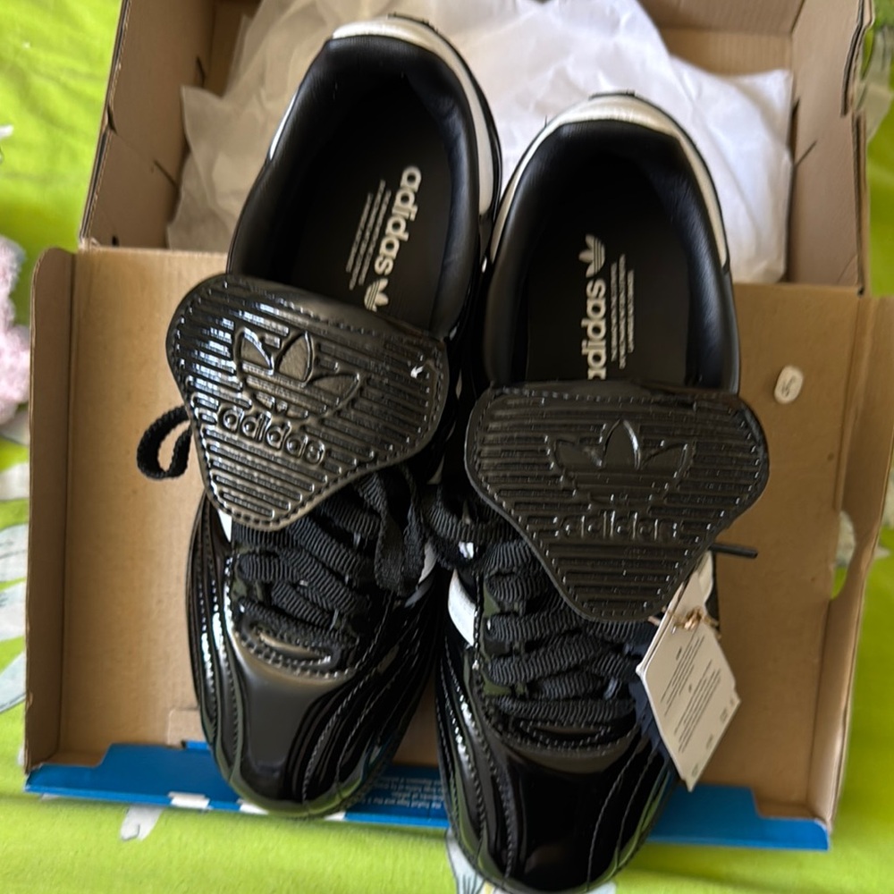 Adidas Black Sneakers with Mesh Upper and Rubber Sole